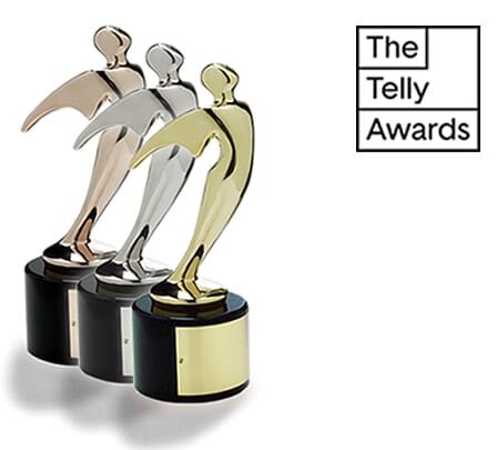 Telly Awards trophies in gold, silver, bronze.